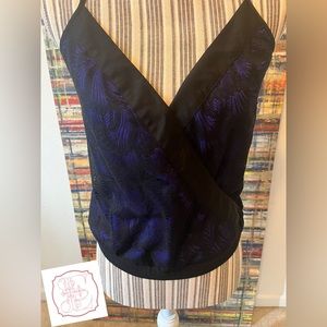 Bebe Top, size x-small. Purple/Black. Very Pretty. Like New condition.